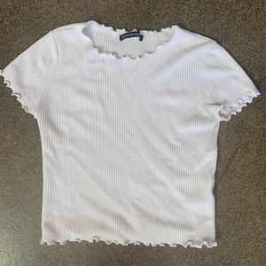 Brandy Melville white ruffle shirt. Worn lightly.